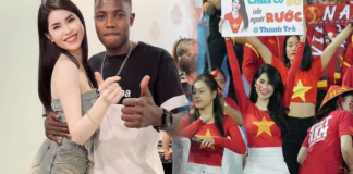 Chàng trai châu Phi sánh đôi bên “bóng hồng” nổi tiếng trên SVĐ Mỹ Đình, dáng chụp gây tranh cãi